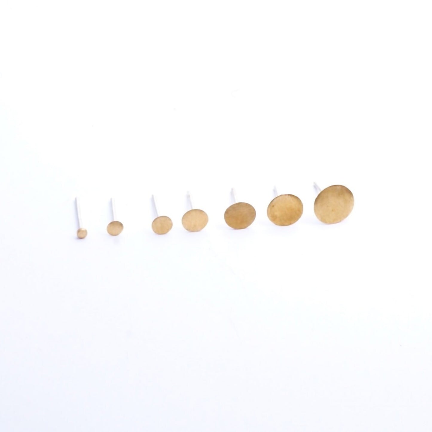 Size comparison of 2mm, 3mm, 4mm, 5mm, 6mm, 7mm, and 8mm studs